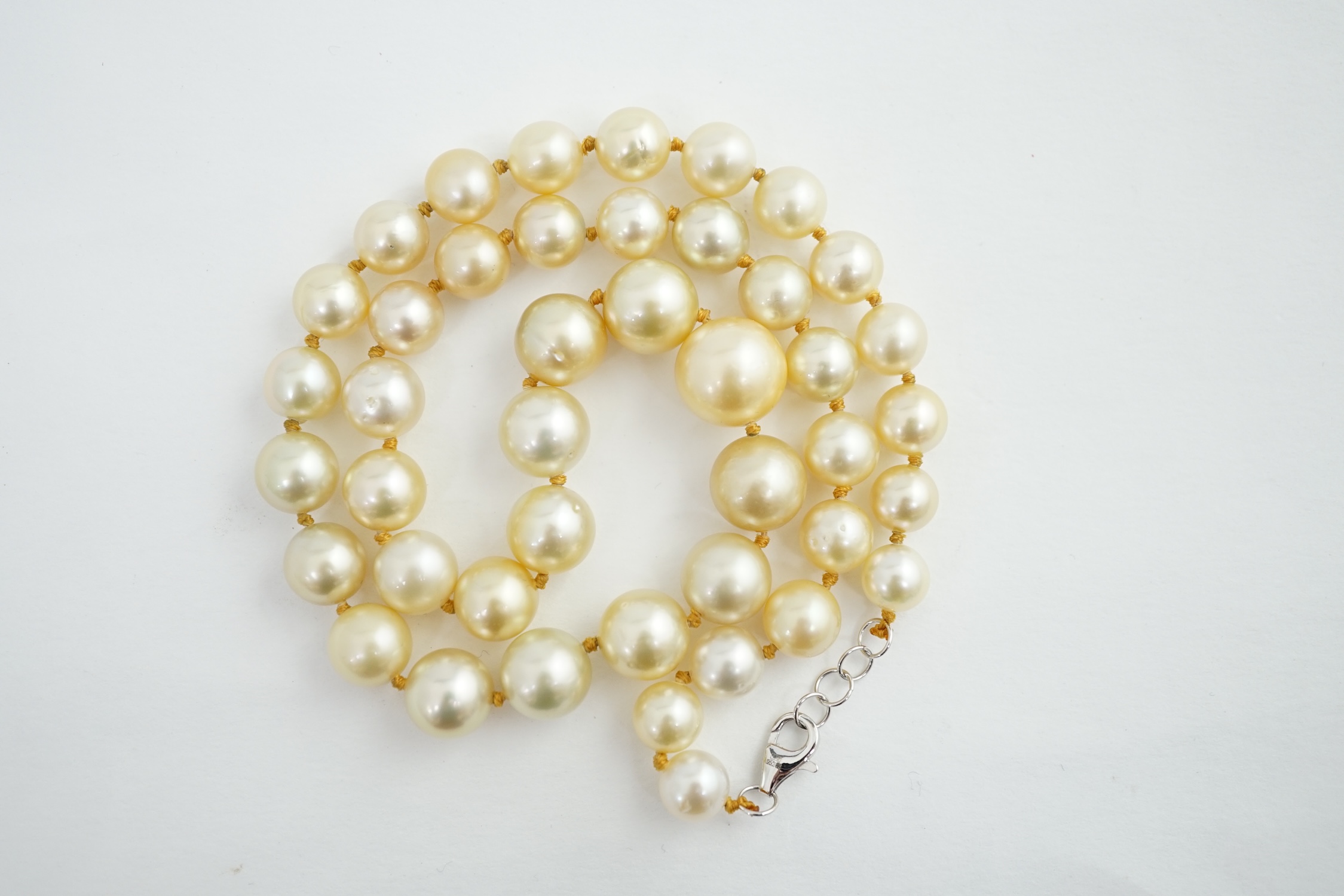 A single strand graduated South Sea pearl necklace, with platinum clasp